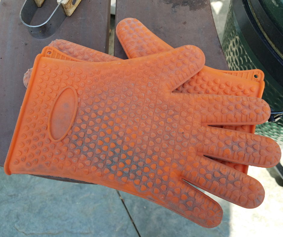 A Pair of Orange Grill Gloves
