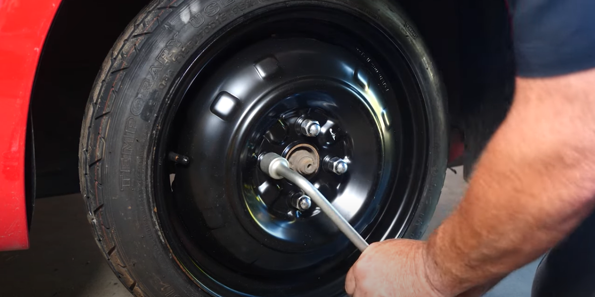 How to Change a Flat Tire: Install the Donut