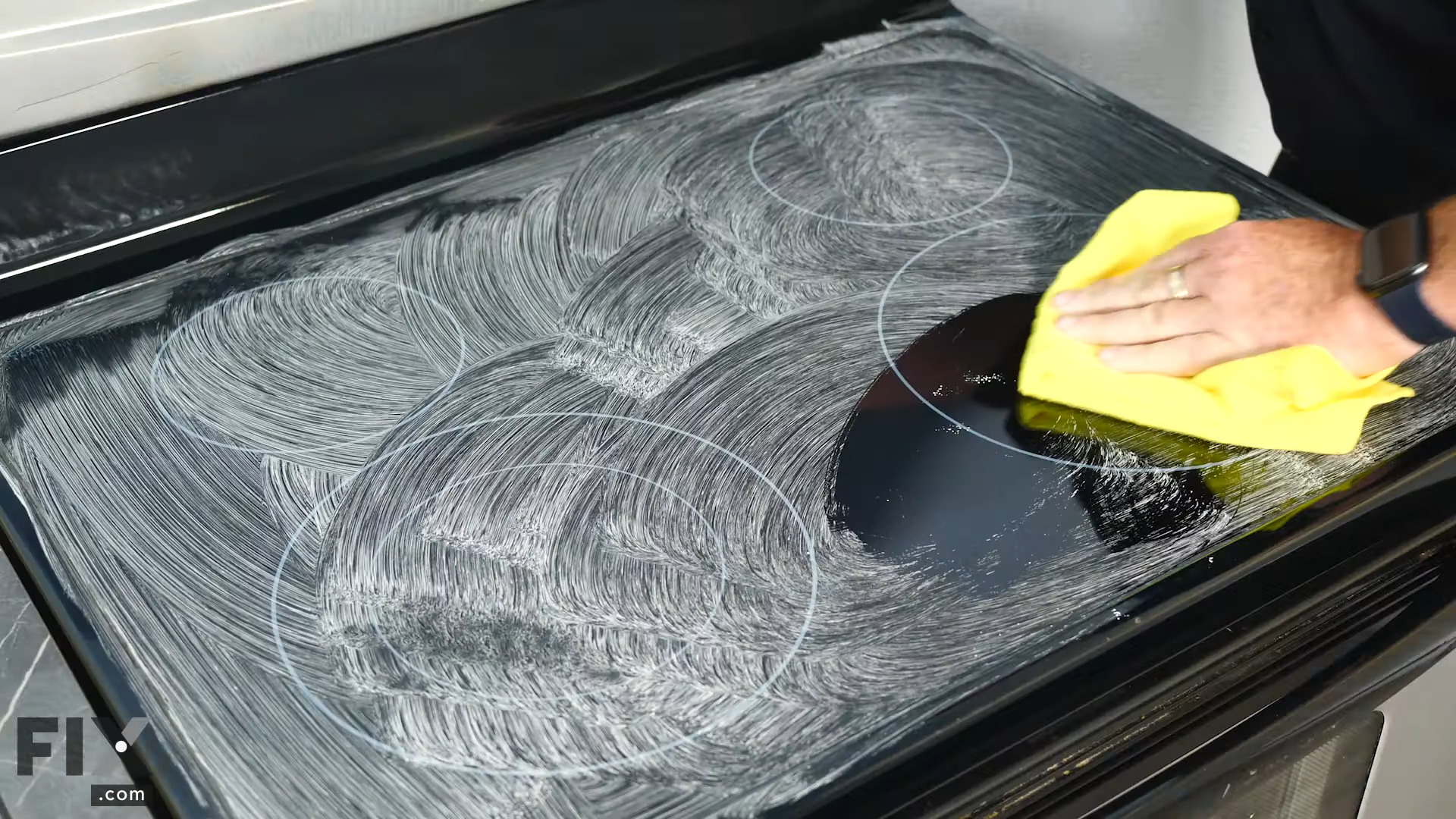 Cleaning a Stovetop by Wiping it Down