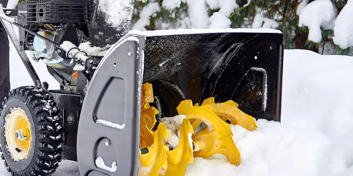 Snow in snowblower auger blades