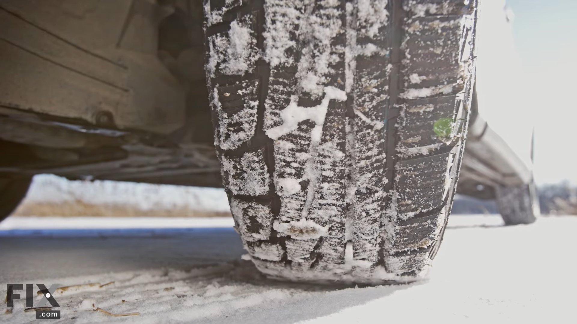 Snow Tires on Snowy Road