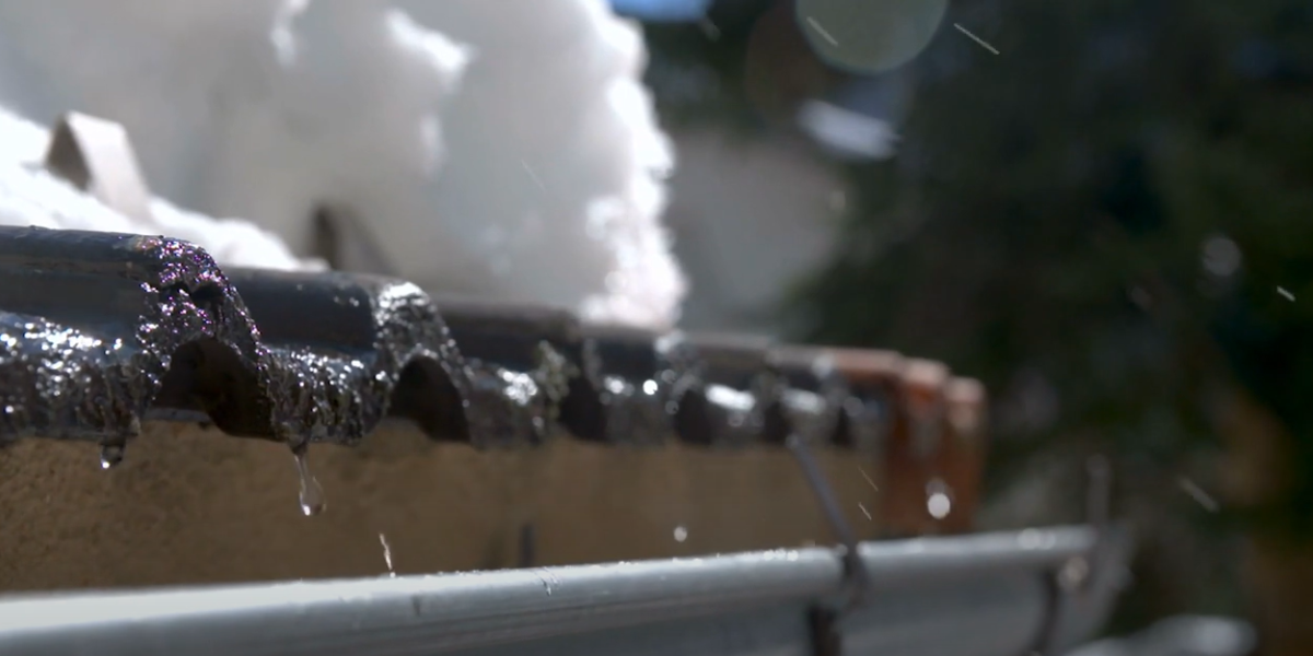 House gutter filled with water