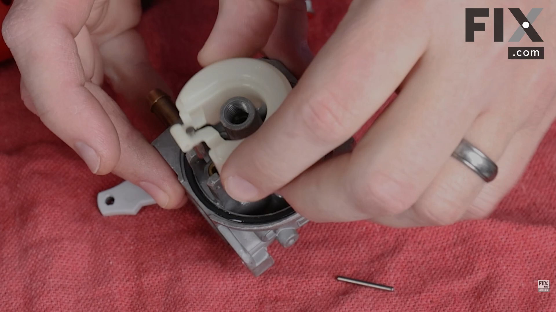 Removing the Float from a Carburetor
