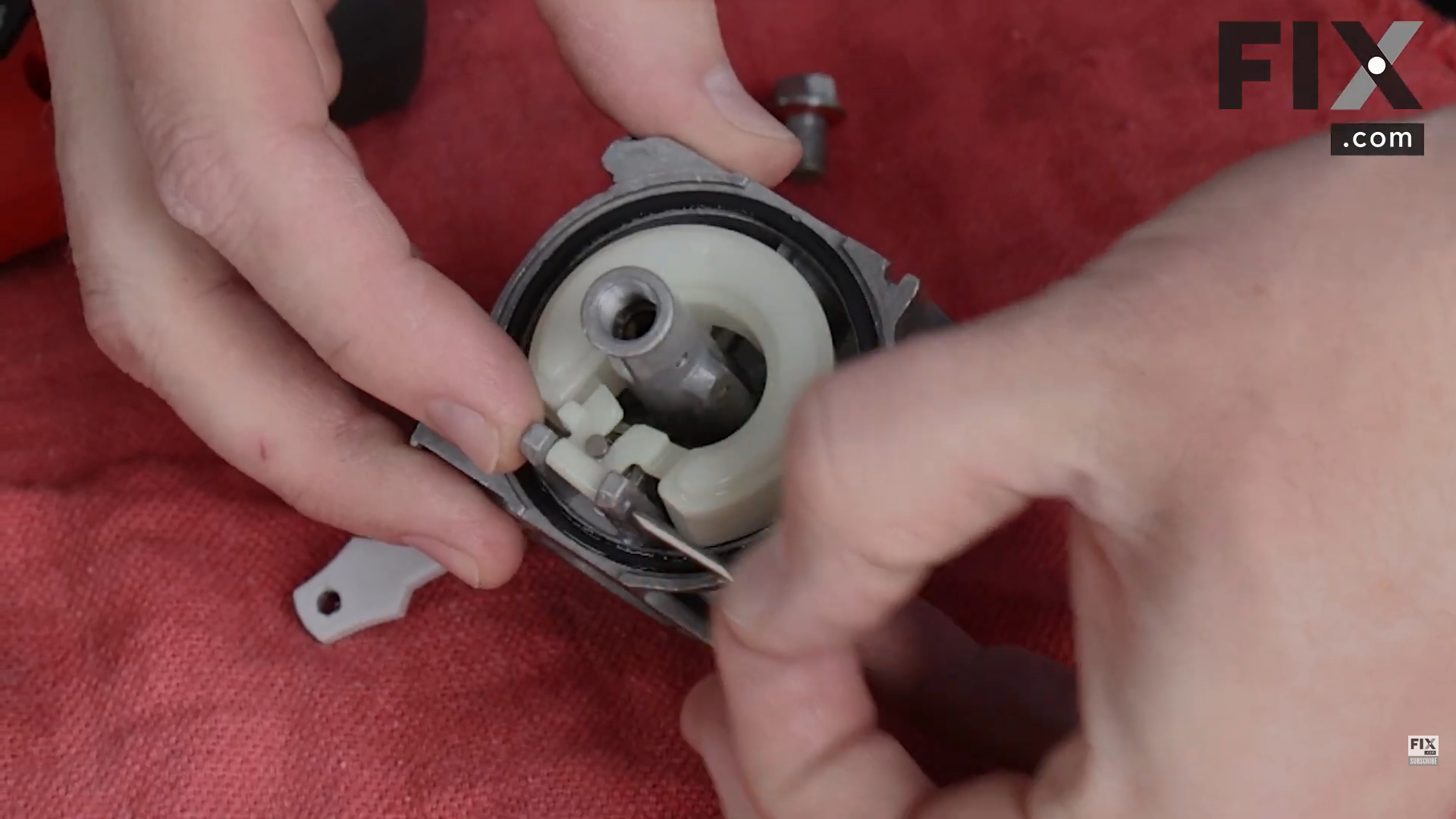 Removing the Metering Needle from a Carburetor